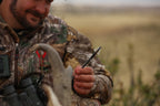 Slick Trick ViperTrick, bowhunter holding chisel-tip broadhead in the field
