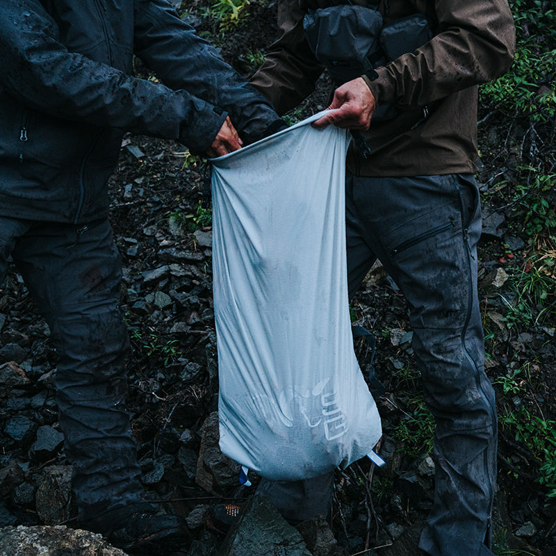 Stone Glacier Game Bag, being loaded in the field