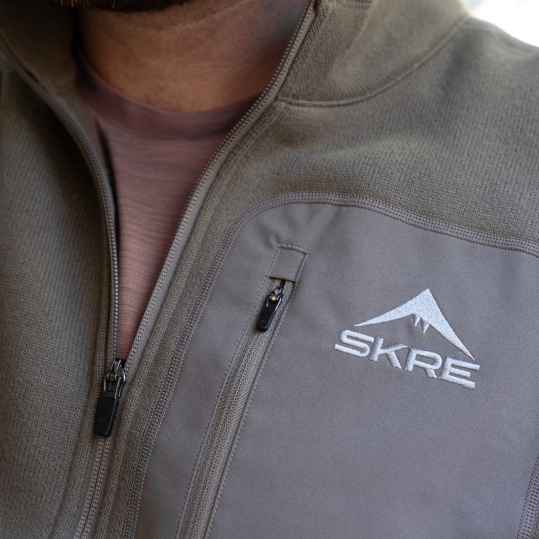 SKRE Blacktail Sweater, Ash Brown, zippered chest pocket detail
