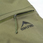 SKRE Hardscrabble Pants, Olive Green logo and zip pocket detail