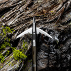Beast 2.0in 150g Stainless Steel Broadhead on arrow, swept-blade profile