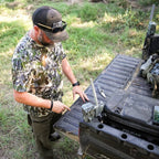 SKRE Venture Flex Pant worn setting a trail camera