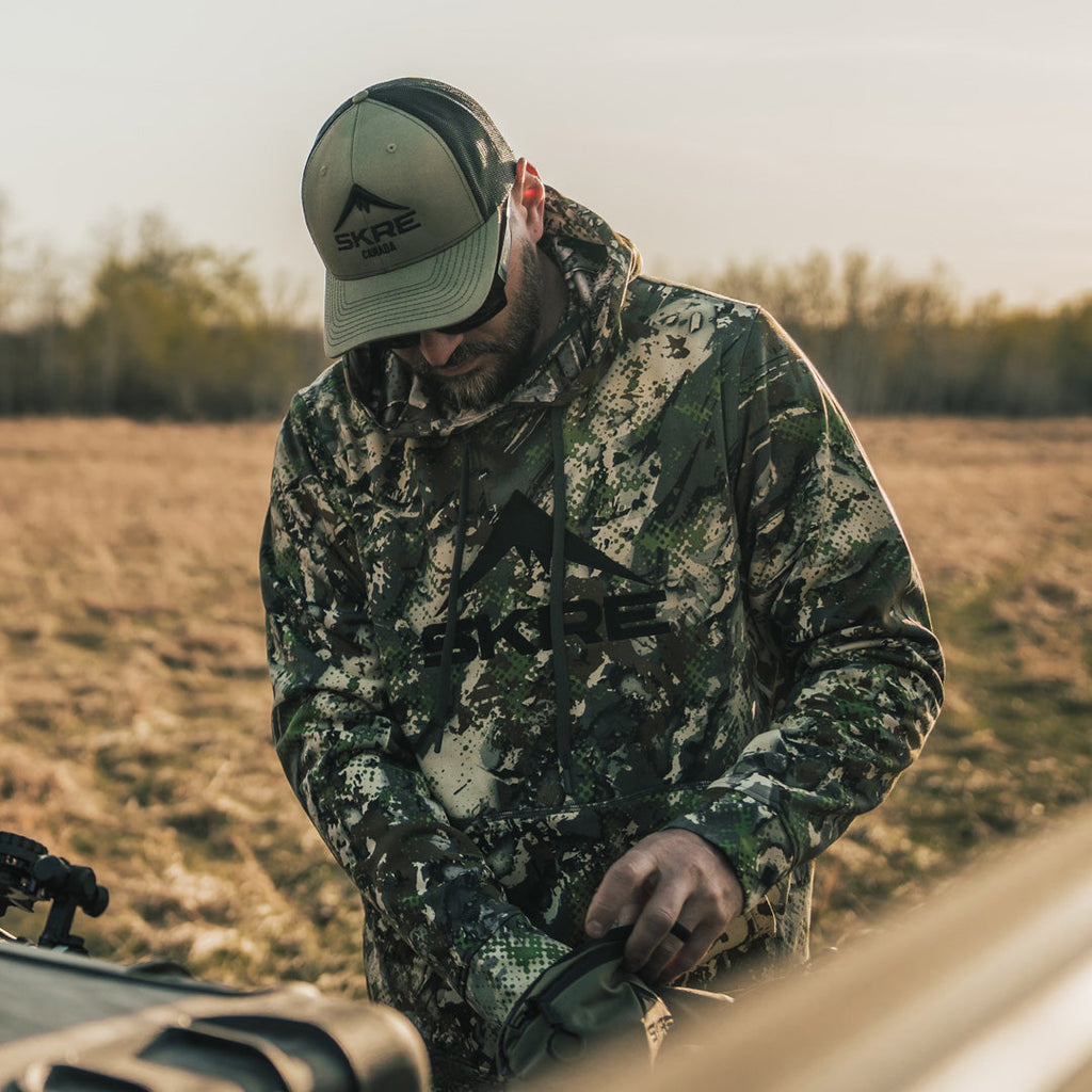 SKRE Mad Trapper Hoodie, Summit, worn in the field