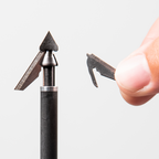 A QAD Exodus broadhead with a replacement blade being fitted by hand