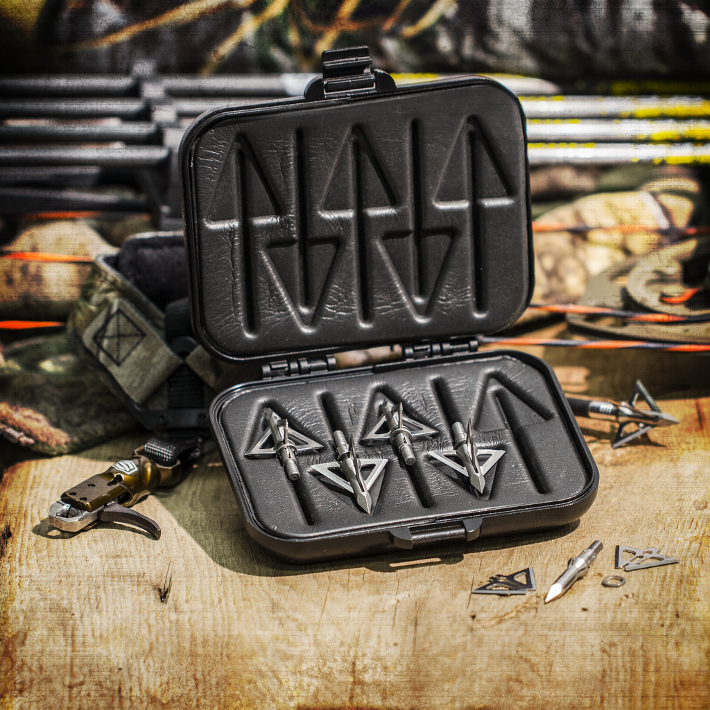 Slick Trick SlickSafe broadhead box open with broadheads, field setting