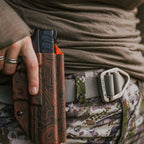 SKRE Timber Hitch Belt, neutral grey, worn in the field