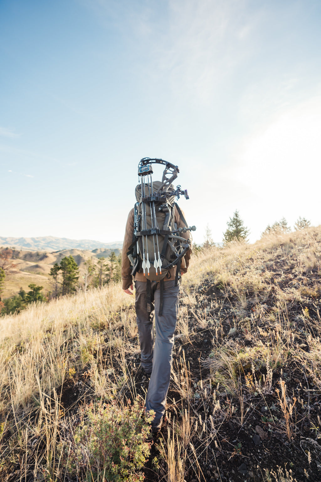 Stone Glacier Bow Sling, bow carried hands-free on a pack in the backcountry