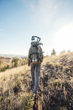Stone Glacier Bow Sling, bow carried hands-free on a pack in the backcountry