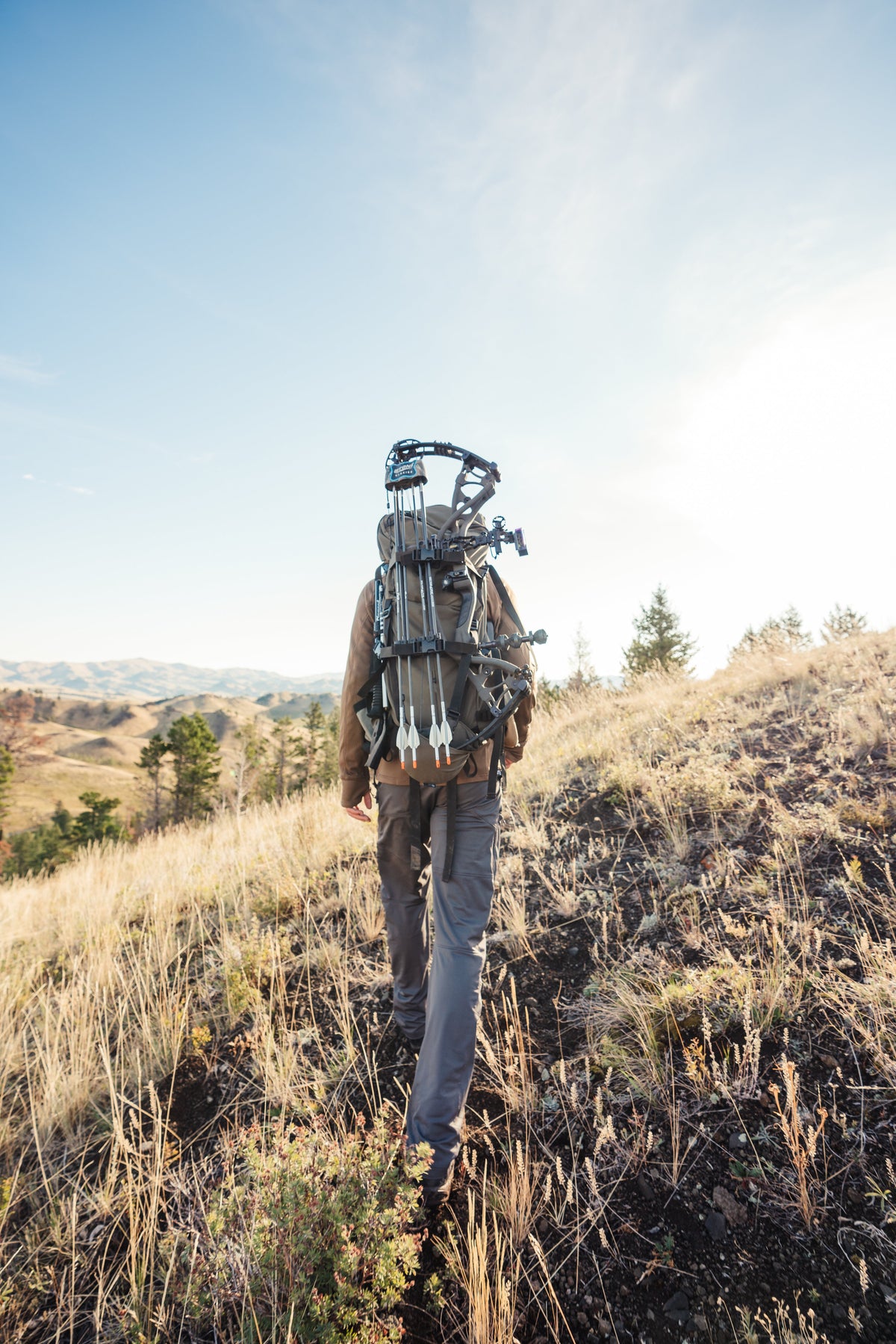 Stone Glacier Bow Sling, bow carried hands-free on a pack in the backcountry