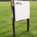 RangeDog PLUS archery target on its outdoor stand in a field