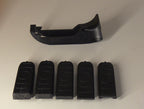 Bedford Archery adjustable Hoyt grip with its five angle backings laid out