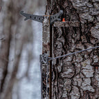 Tethrd Stealth Strips on a climbing stick in the field