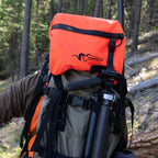 Stone Glacier Sky Series Lid, Blaze Orange mounted on a pack